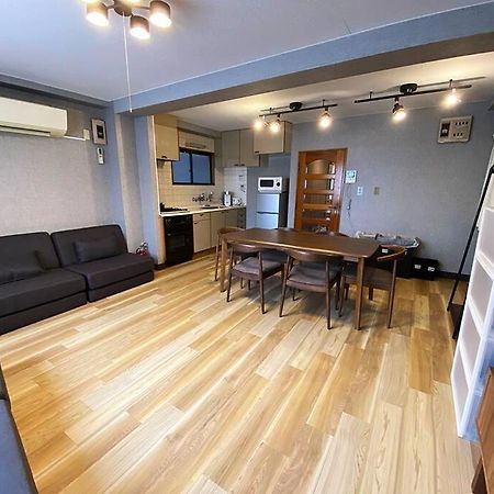 טוקיו New飯田橋ファミリーホテル מראה חיצוני תמונה